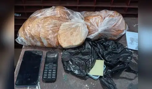 Visita intentó pasar 2 celulares en panes para hamburguesa Visita intentó pasar 2 celulares en panes para hamburguesa