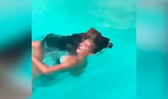 Dueña de perro simula que se asfixia dentro de piscina y osado can se lanza para rescatarla [VIDEO]