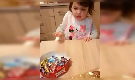 YouTube: Le ofrecen chocolates a una niña y ella tiene insólita reacción