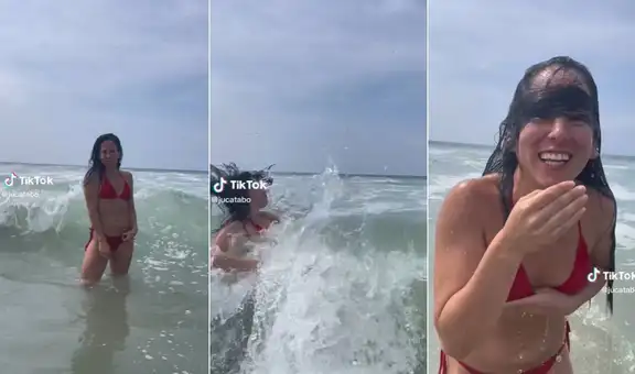 Intenta tomarse una foto en la playa, pero una fuerte ola arruina sus planes y la revuelca