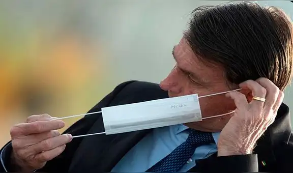 Reportan que Bolsonaro usó calumnias homofóbicas para burlarse de quienes usan mascarillas