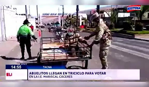 Pareja de adultos mayores acude a centro de votación a bordo de un triciclo en Tacna