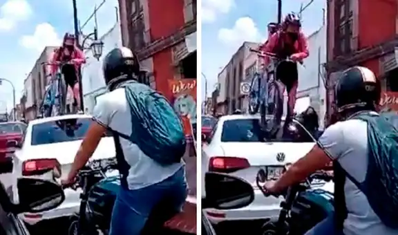 Ciclista camina por encima de un auto al ver que no respetaba la ciclovía