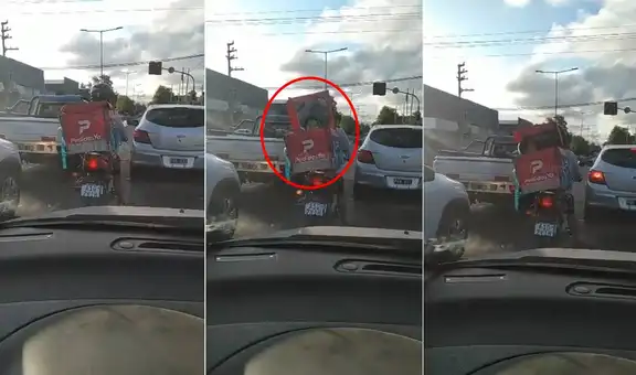 Repartidor es captado mientras lleva a su hijo dentro de su caja de delivery