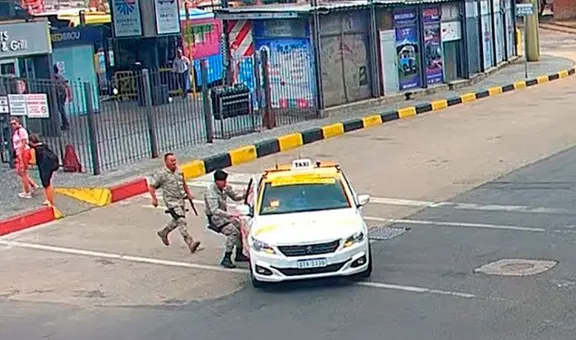 Policías se suben a un taxi y persiguen a 2 delincuentes que acababan de robar un celular