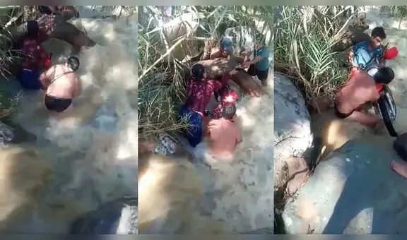 Mujer es rescatada de morir tras intentar cruzar una quebrada en motocicleta