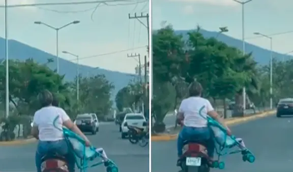 Captan a pareja viajando en moto con un bebé sentado en su cochecito