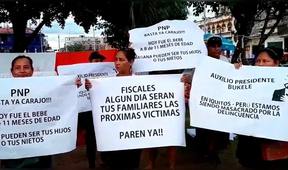 Ciudadanos marchan tras asesinato de bebé con pancartas de Bukele en Iquitos