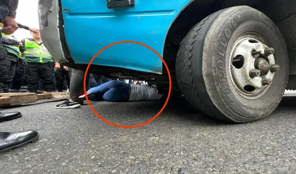 SJL: mujer se mete debajo de cúster informal para evitar traslado al depósito