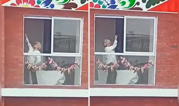 Adulta mayor baila marinera desde la ventana de su casa durante el Gran Desfile Militar
