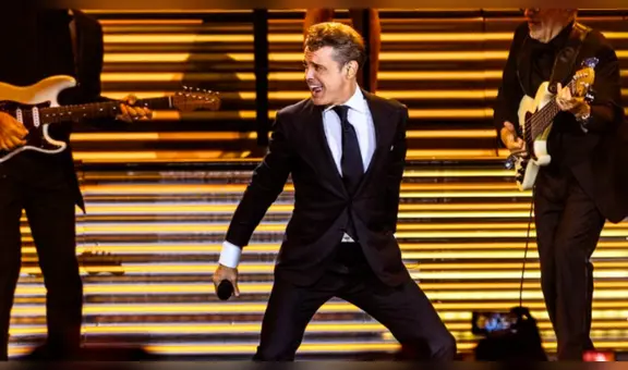 Luis Miguel genera polémica por pedirle a trabajador que lo siga con un paraguas para no mojarse