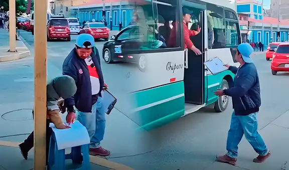 Padre ayuda a su hijo con su tarea mientras trabaja en parada de transporte y es viral: "Padres como él hay pocos"