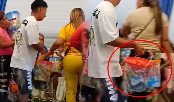¡Increíble sorpresa! Invitados a una fiesta infantil se quedan sin palabras al recibir baldes llenos de caramelos