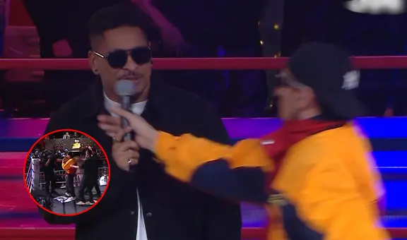 Sujeto irrumpe en el ring de 'La Noche Dorada' 2025 y le arrebata el micrófono al presentador para cantar su canción: fue detenido a los pocos segundos