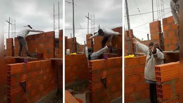 Albañiles olviden su wincha, pero usan sus brazos para medir y continuar con la construcción
