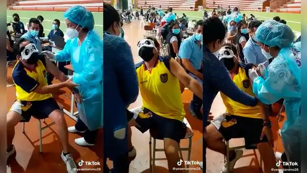 Hombre se enfrenta a su fobia a las agujas y usa antifaz de oso panda al vacunarse