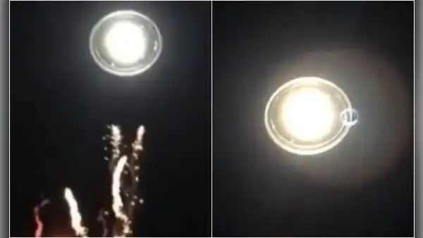 Joven se pasa de copas y confunde una farola con un ovni durante un festival de cerveza