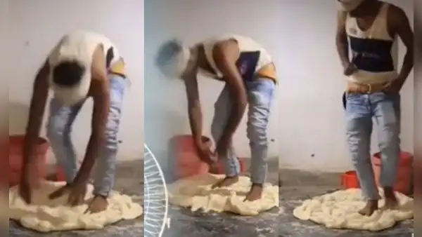 Joven que vende empanadas en la calle es captado preparando la masa con sus pies