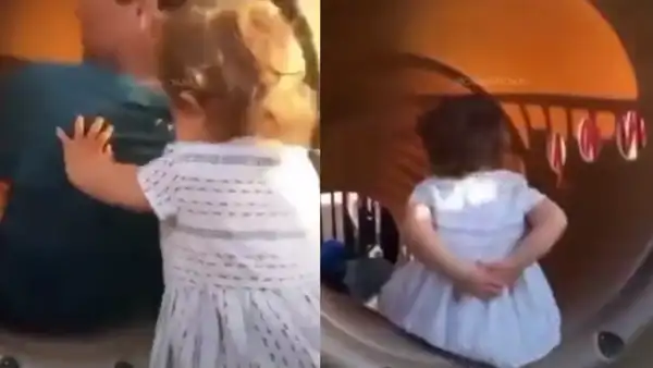 Niña tiene miedo de lanzarse por el tobogán, pero se arma de valentía y se da su propio empujón