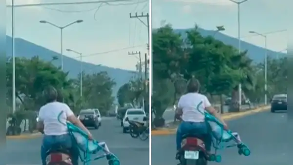 Captan a pareja viajando en moto con un bebé sentado en su cochecito