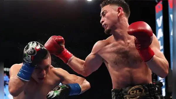 ¡Nuevo campeón! José 'Rayo' Valenzuela le arrebató a 'Pitbull' Cruz el título superligero AMB