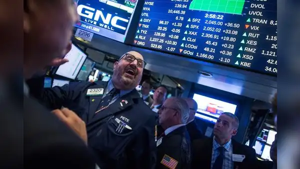 Wall Street al alza tras anuncio de la bajada de tipos de la Fed