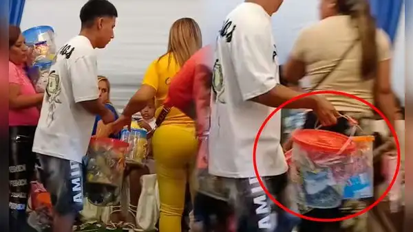 ¡Increíble sorpresa! Invitados a una fiesta infantil se quedan sin palabras al recibir baldes llenos de caramelos