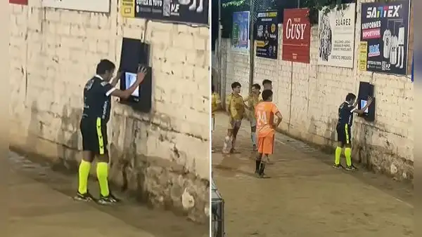 Árbitro de pichanga causa sorpresa al acercarse a pantalla para revisar falta: "Sin pasto, pero con VAR"