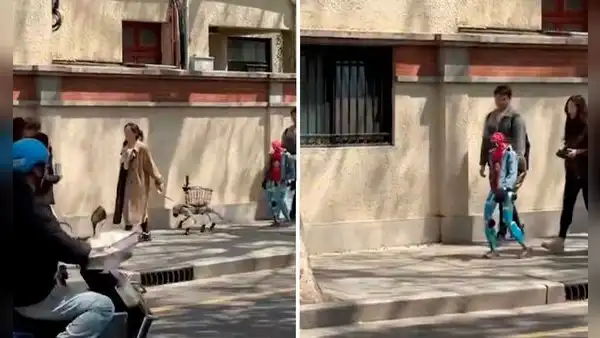 Ciudadanos chinos son captados paseando en la calle con sus robots mascota: "¡Hasta les pusieron ropa!"