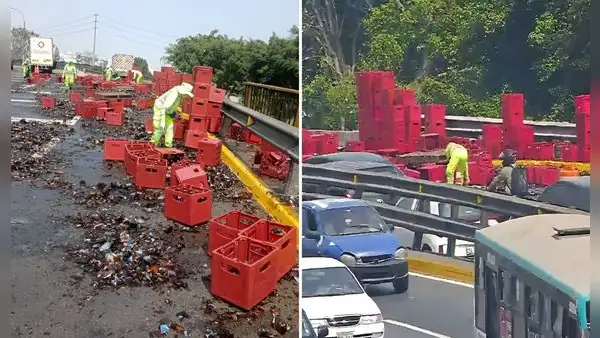 Decenas de cajas de cerveza quedan regadas en la Vía de Evitamiento tras accidente de camión de carga