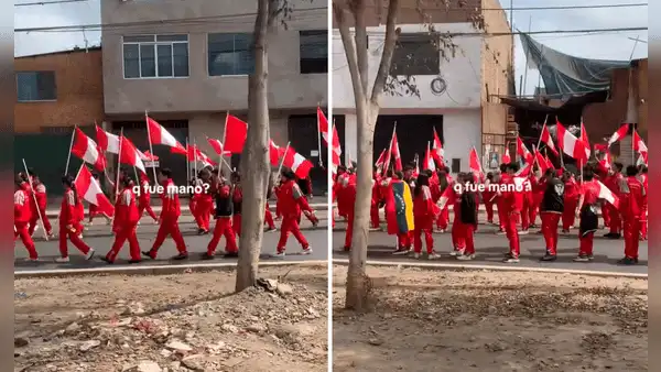 Peruano graba desfile por Fiestas Patrias y nota a escolar llevando bandera de Venezuela