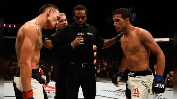 Max Holloway vs Charles Oliveira EN VIVO por la UFC 326: hora y canal para ver la pelea estelar por el título BMF