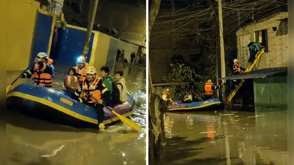 Rescatistas usaron botes inflables para evacuar a vecinos atrapados por lluvias intensas en Villa El Salvador