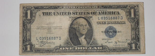 Junto con la 'L' dentro del número de serie, el sello de color azul vuelven vuelve valioso a este billete de 1 dólar. Foto: eBay  