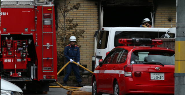 Firefighter works the scene where over 30 people died in a fire at the Kyoto Animation company building in Kyoto on July 19, 2019. - Details emerged July 19 of a horrifying inferno that tore through a Japanese animation firm and killed dozens, with people jumping out of the three-storey building and others trapped in a staircase unable to escape. (Photo by Buddhika Weerasinghe / AFP)