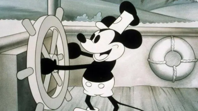  Diseño de Mickey Mouse que debutó en el cine en 1928, en el cortometraje 'Steamboat Willie'. Foto: captura Disney 