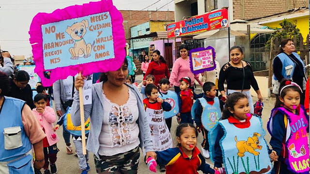 Niños marchan con carteles para promover tenencia responsable de mascotas [FOTOS]