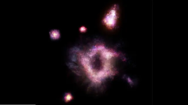 La galaxia "anillo de fuego" está acompañada por pequeñas galaxias satélites. Crédito: James Josephides, Swinburne Astronomy Productions.