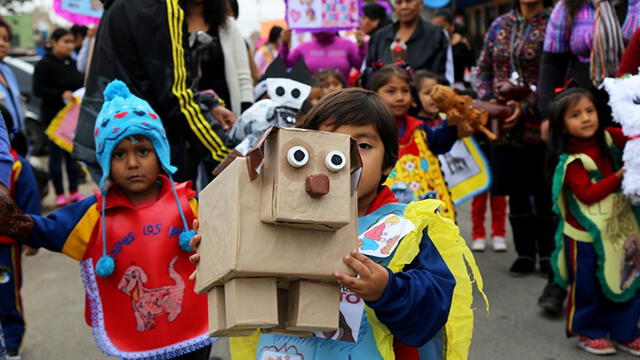 Niños marchan con carteles para promover tenencia responsable de mascotas [FOTOS]