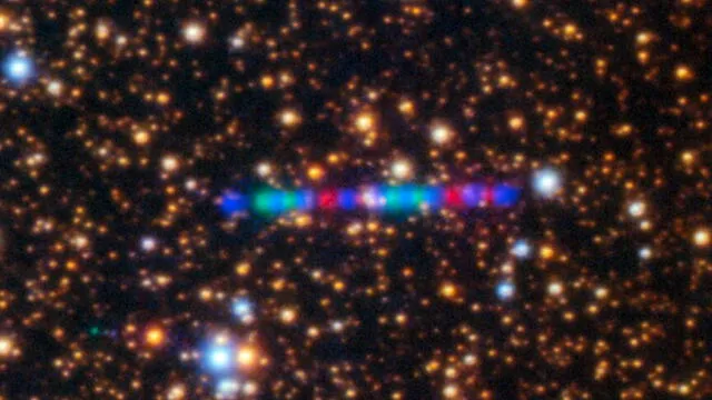  El 3I/ATLAS en un gigantesco "arcoíris cósmico". Foto: Observatorio Internacional Gemini   