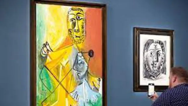 En esta subasta se ofertaron las pinturas "Homme et enfant" y "Tete d'homme" de Pablo Picasso. Foto: AFP