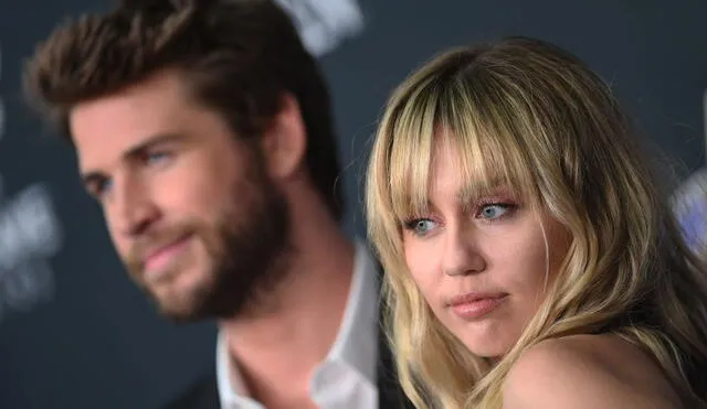 US singer Miley Cyrus and Australian actor Liam Hemsworth arrive for the World premiere of Marvel Studios' "Avengers: Endgame" at the Los Angeles Convention Center on April 22, 2019 in Los Angeles. (Photo by VALERIE MACON / AFP)        (Photo credit should read VALERIE MACON/AFP/Getty Images)