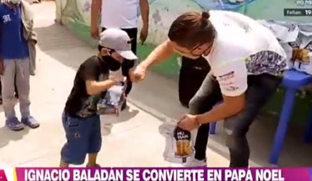 Ignacio Baladán colabora con niños de bajos recursos en El Agustino. Foto: captura de América TV