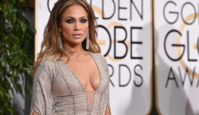 Jennifer Lopez y sus increíbles looks en alfombras rojas. (Foto: AFP)