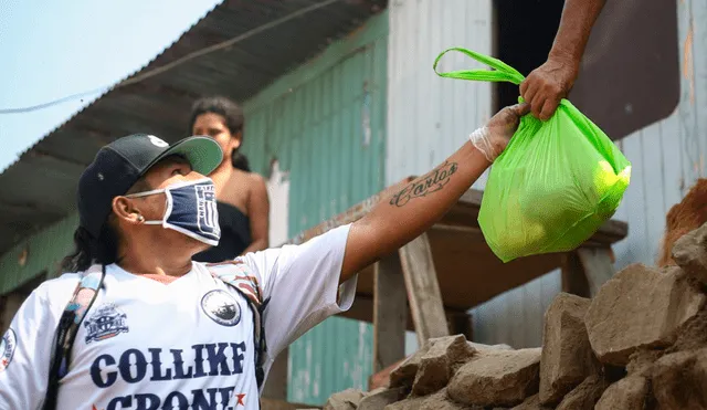 Un grupo de hinchas del Comando Sur, en conjunto con el Club Oficial de Alianza Lima, el Fondo Blanquiazul y el banco de alimentos, se juntaron para hacer posible esta ayuda. (FOTO: Hanslitt Cruzado).