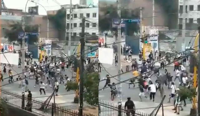 Barristas de Alianza Lima se enfrentan afuera del Alejandro Villanueva. Foto: Captura