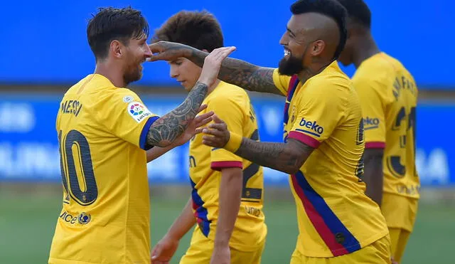 Lionel Messi y Arturo Vidal jugaron juntos en Barcelona desde mediados del 2018. Foto: AFP.