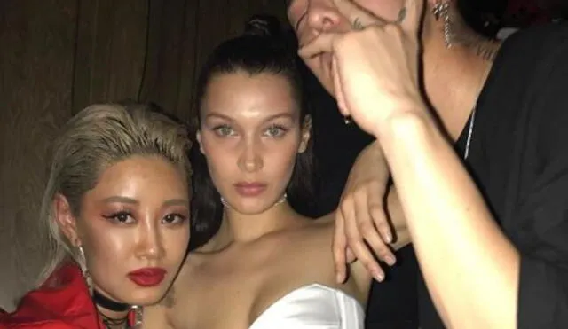 GD y Bella Hadid celebrando en el evento cerrado de la marca PEACEMINUSONE.