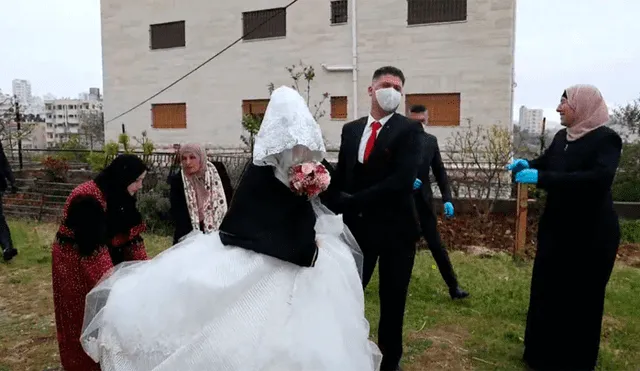 Cisjordania: novios celebran su boda enmascarados pese a restricciones por el coronavirus [VIDEO]