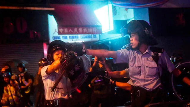 Durante las manifestaciones en Hong Kong se registró al menos un disparo. Foto: AFP